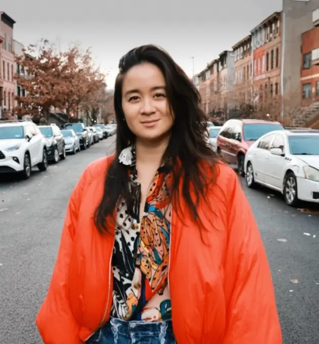 Photo of Allison smiling.